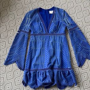 Dress with bell sleeves. Very pretty v neck